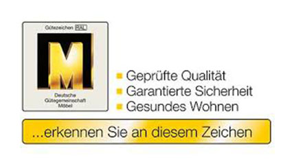 Logo mit einem goldenen M, daneben steht "Geprüfte Qualität, Garantierte Sicherheit, Gesundes Wohnen ... erkennen Sie an diesem Zeichen".